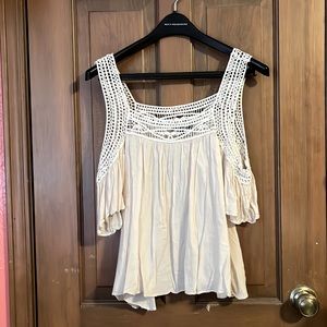 Sumer time light blouse. Would look cute with a pair of jeans.